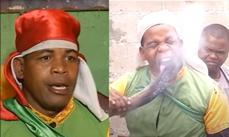 El hombre brasa que come carbón prendido