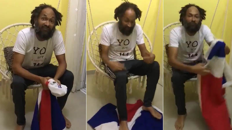 Hombre pisotea bandera dominicana en desafío a las autoridades