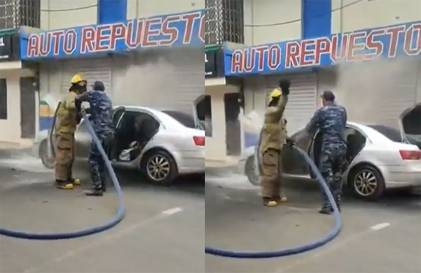 Policía trató de impedir que bombero le echara agua a su carro que se incendiaba