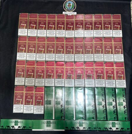 Policía y MP ocupan miles de cigarrillos ilícitos durante allanamientos en La Vega